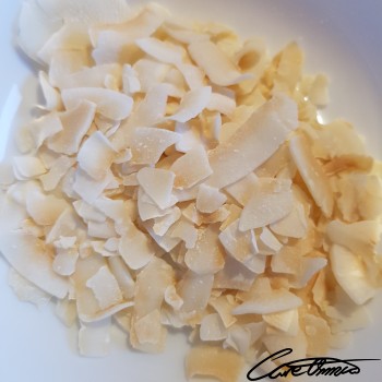 Image of Coconut Meat (Dried, Sweetened, Desiccated, Flaked, Packaged, Nuts) that contains trans-monoenoic fatty acids