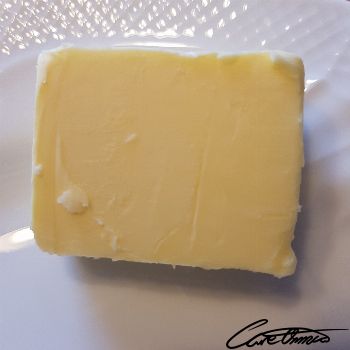 Image of Butter (Without Salt) that contains caproic acid (6:0)