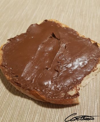 A sandwich with chocolate-flavored hazelnut spread