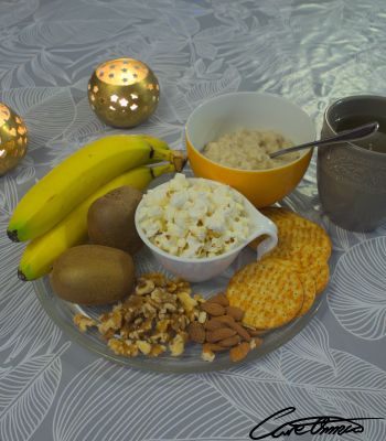 A plate of different foods that work well if you need to eat something before bed