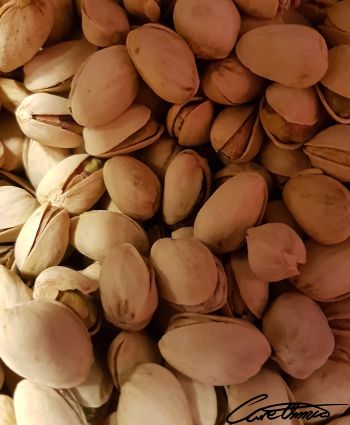 A bunch of pistachio nuts
